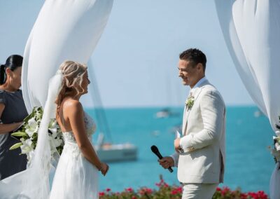 bride and groom getting married mirage whitsundays